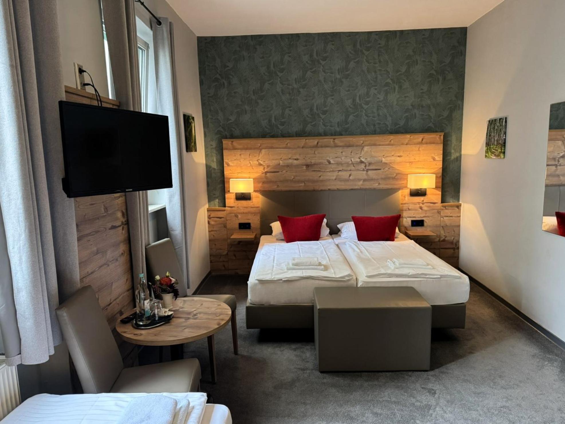 Classic Dreibettzimmer