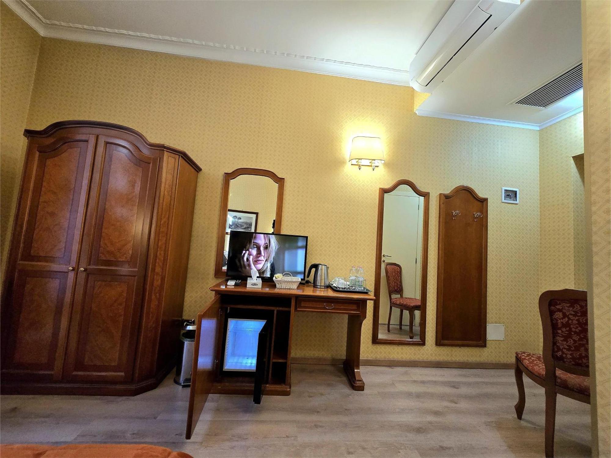 Chambre Triple - Vue sur Ville