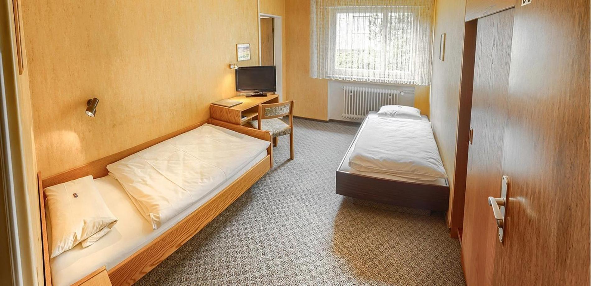 Tweepersoonskamer met 2 Aparte Bedden