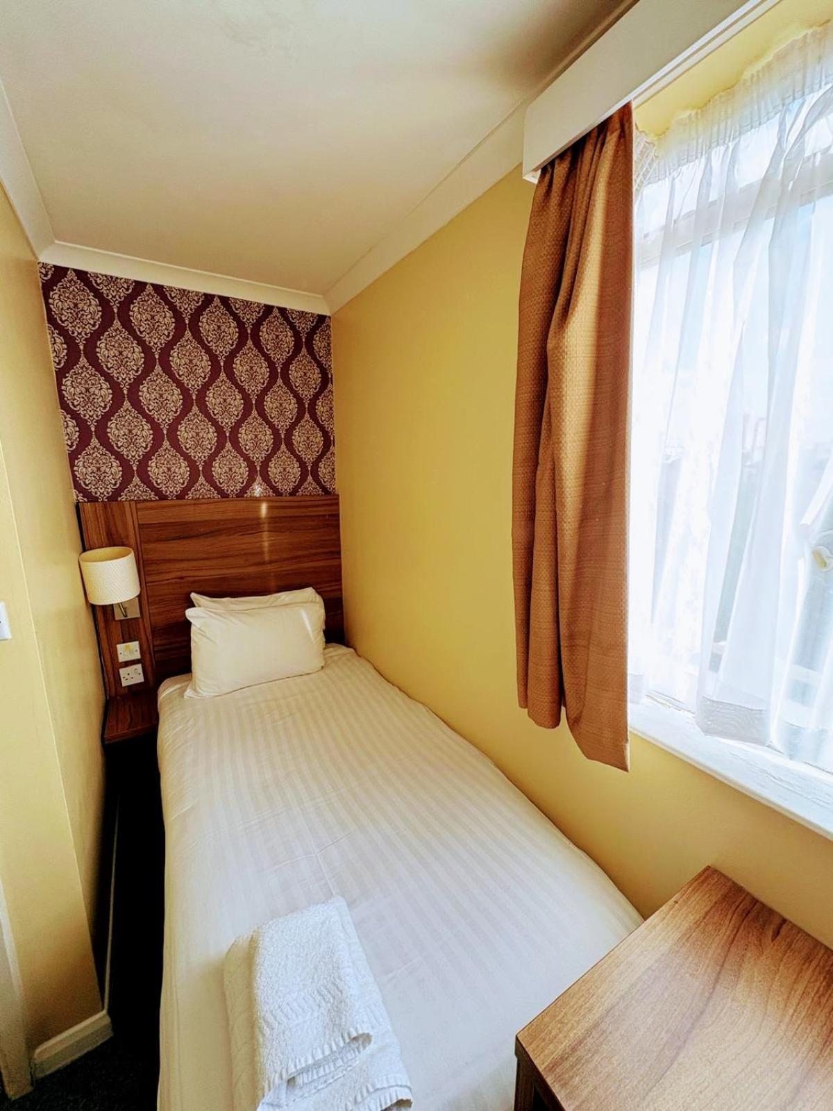 Quarto Individual Econômico