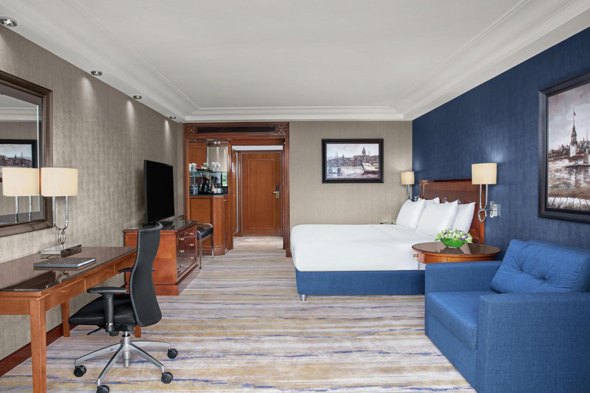 Familiensuite mit Balkon, Gartenblick und Zugang zur Executive Lounge