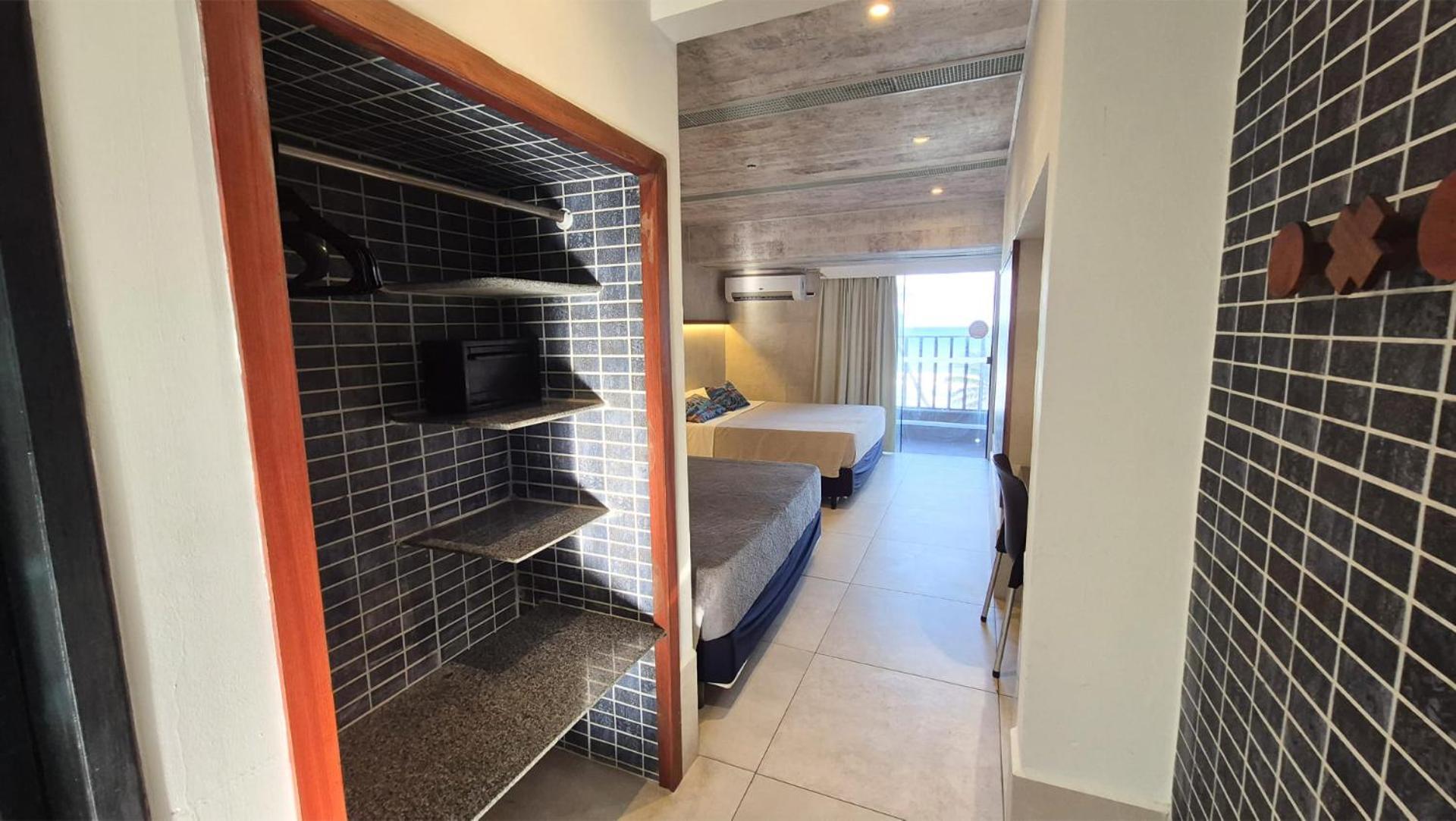 Quarto Família com Vista do Mar