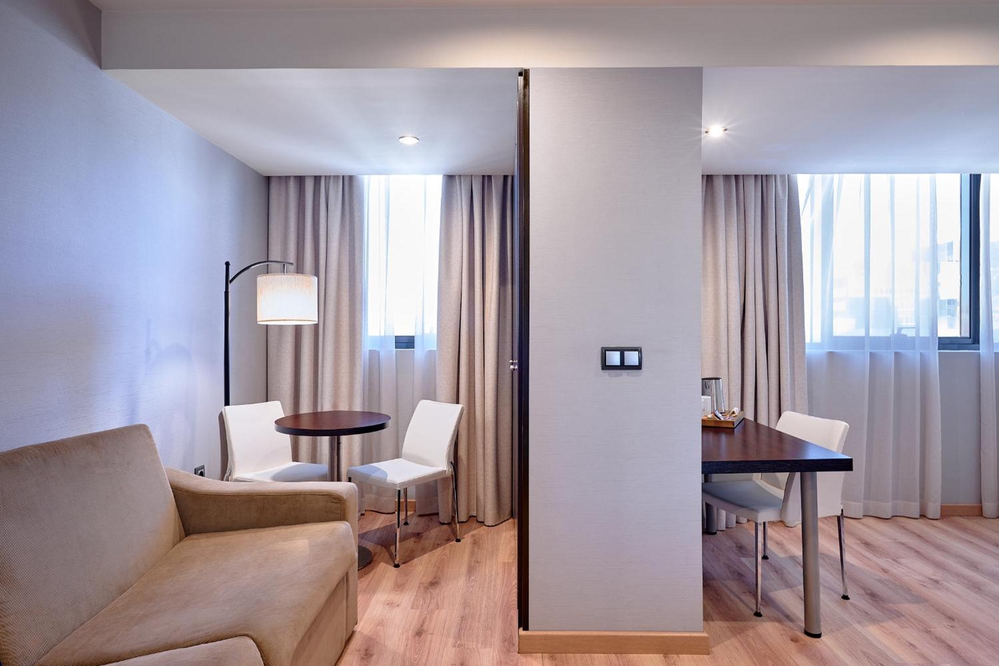 Habitación Deluxe con bañera de hidromasaje.