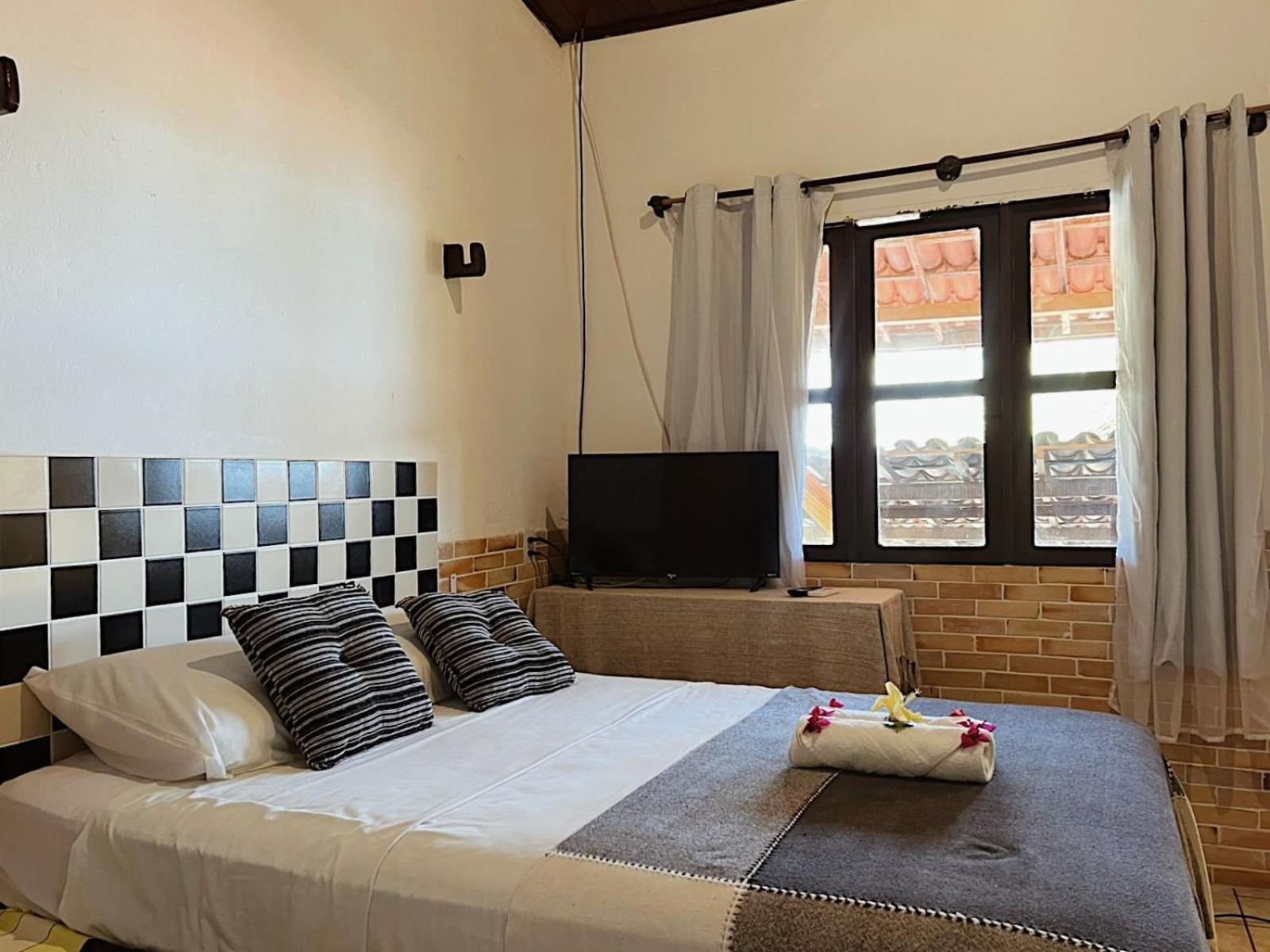 Quarto Família com Varanda