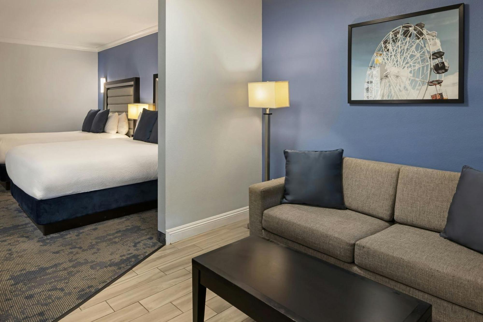 Queen Studio with Two Queen Beds and Sofa Bed - Courtyard View