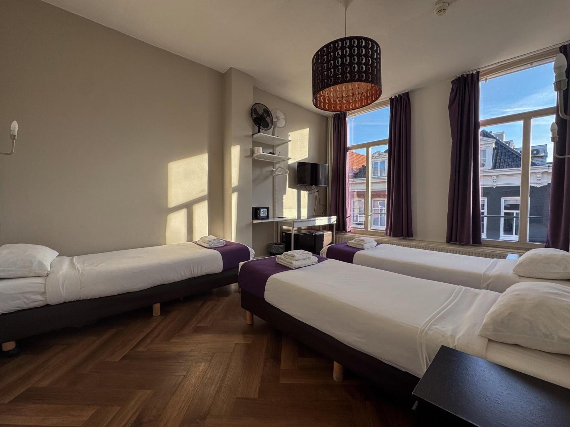 Chambre Triple Économique avec Salle de Bains Commune