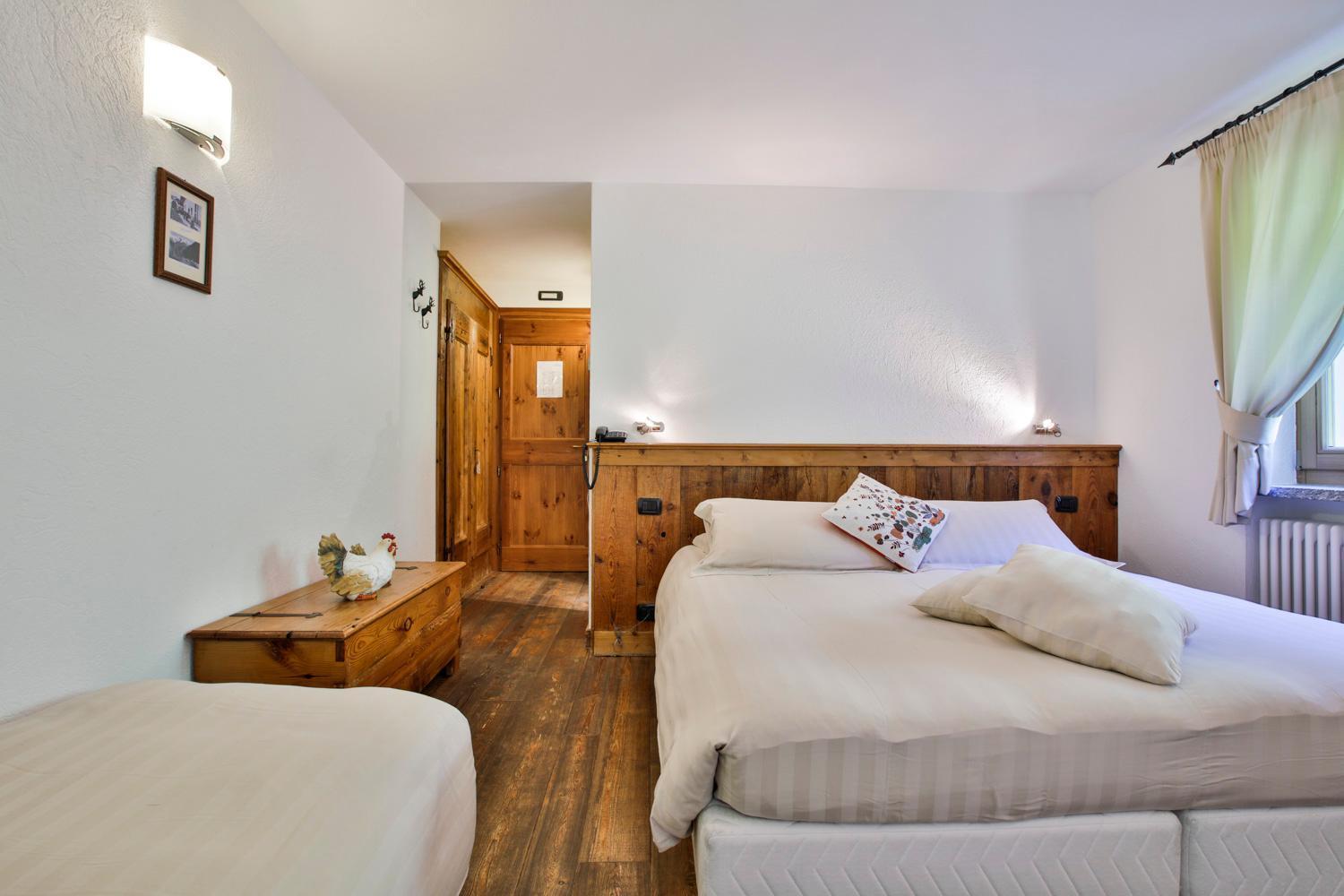 Camera Matrimoniale con Letto Supplementare