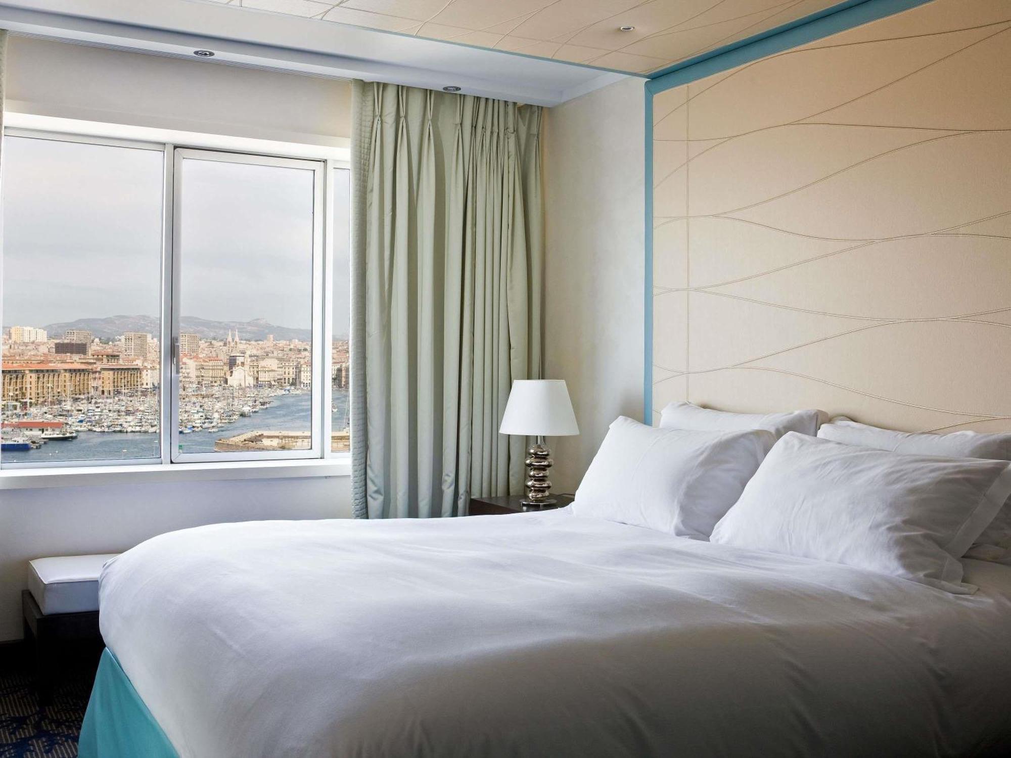 Chambre de Luxe avec 1 Lit Double, Salle de Sport et Spa Sofitel – Vue sur Port