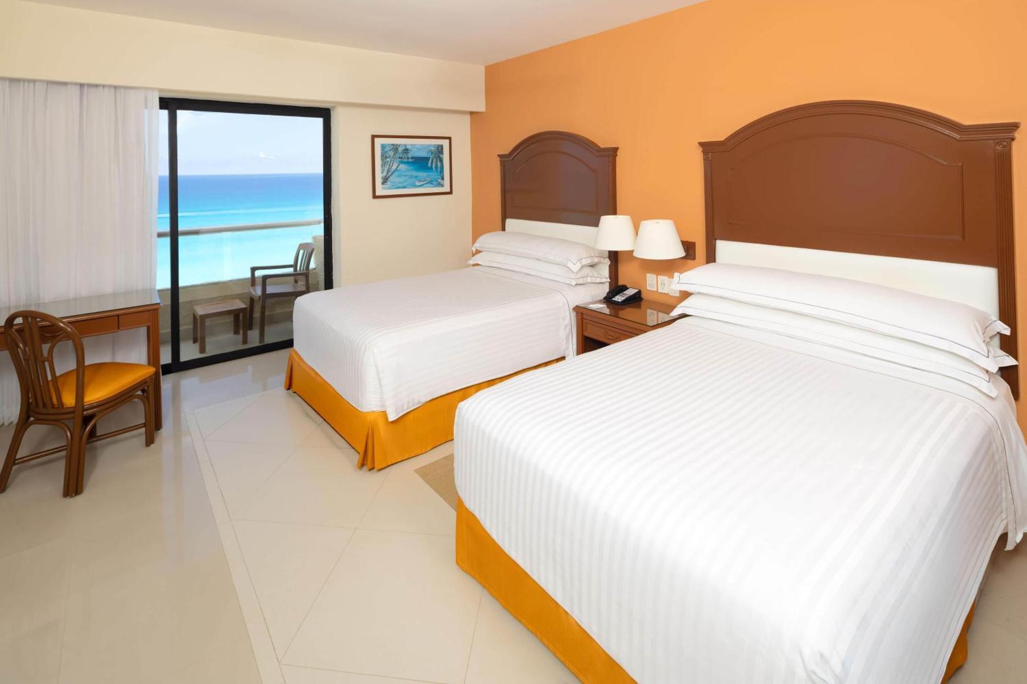 Quarto Duplo Nível Premium à Beira-mar