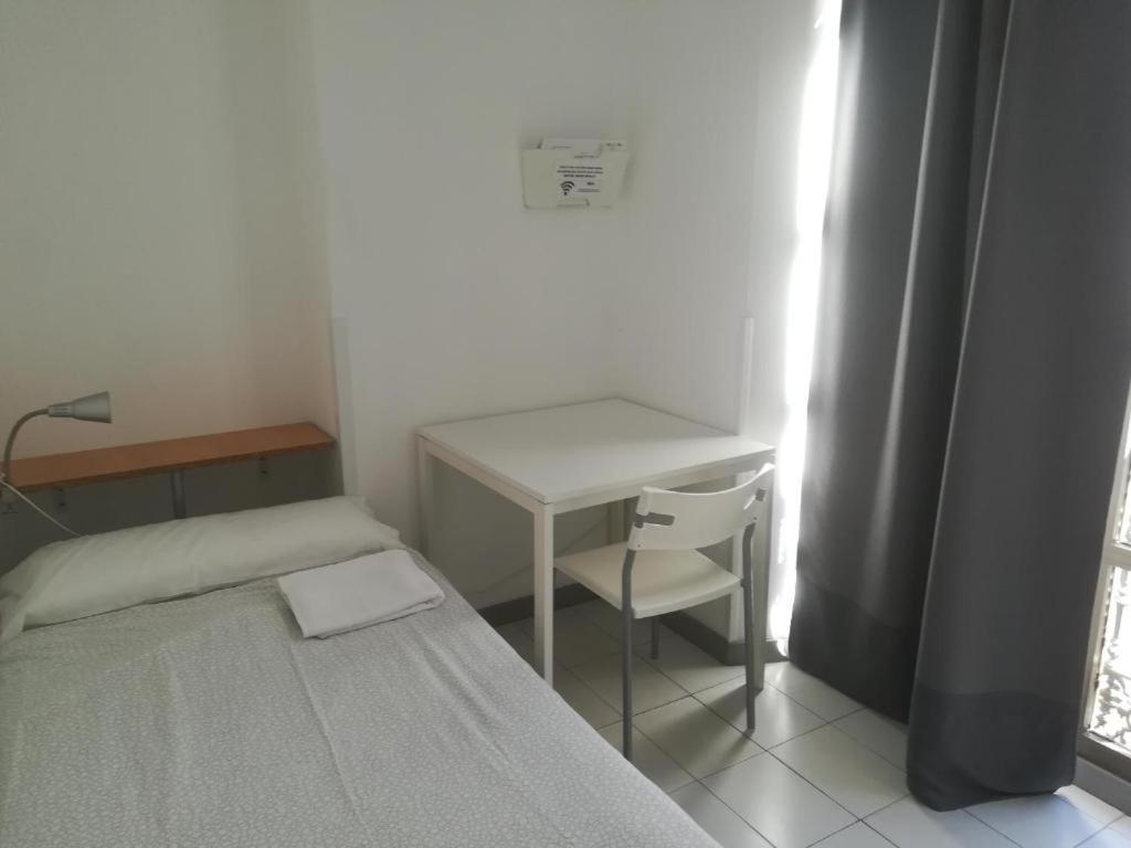 Quarto Individual com Casa de Banho Partilhada