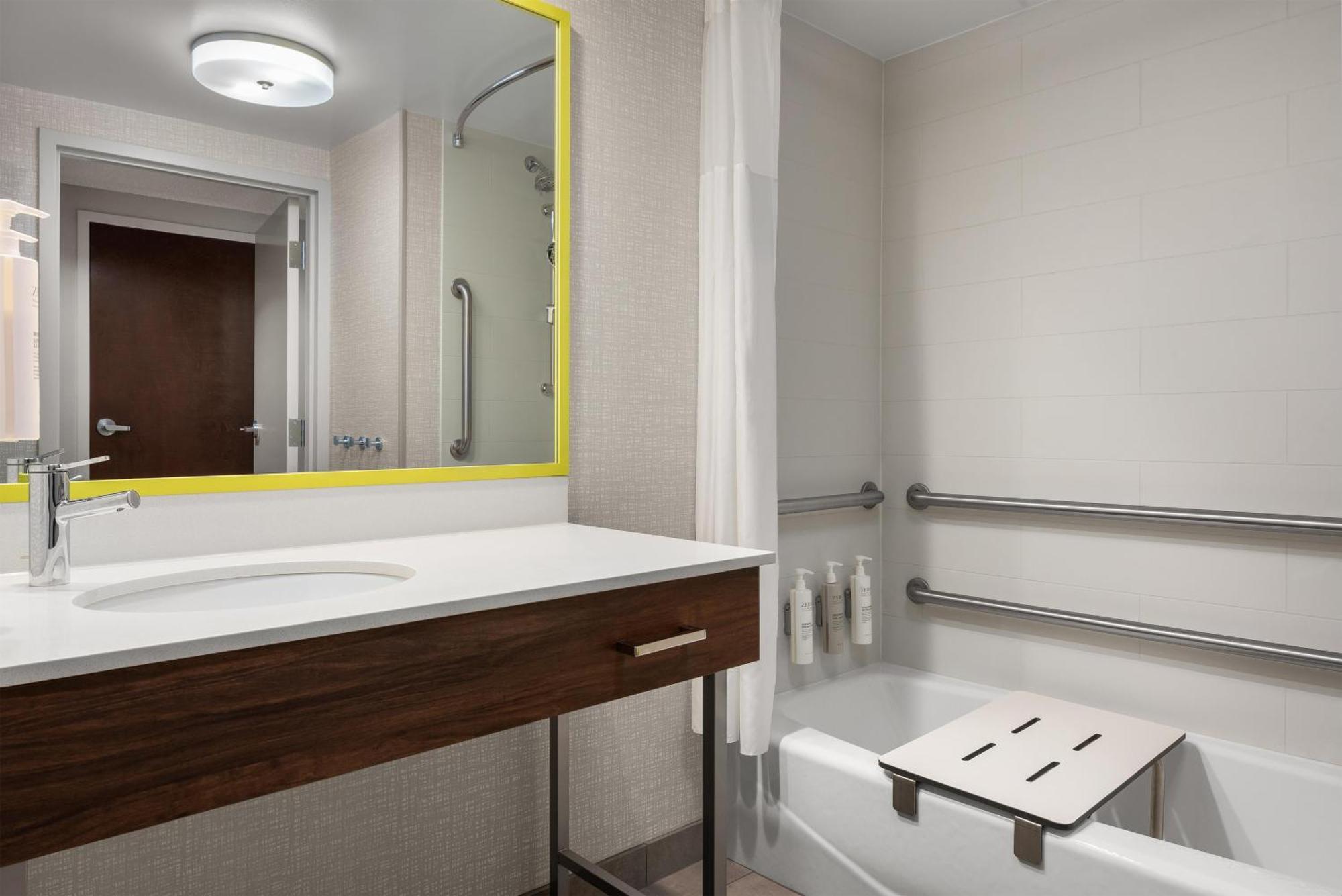 Room with One Full Bed and Bath Tub - Mobility Accessible