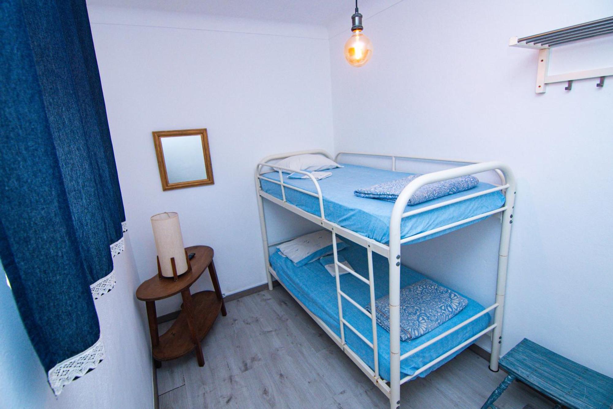 Habitación Doble Estándar con litera - 2 camas individuales