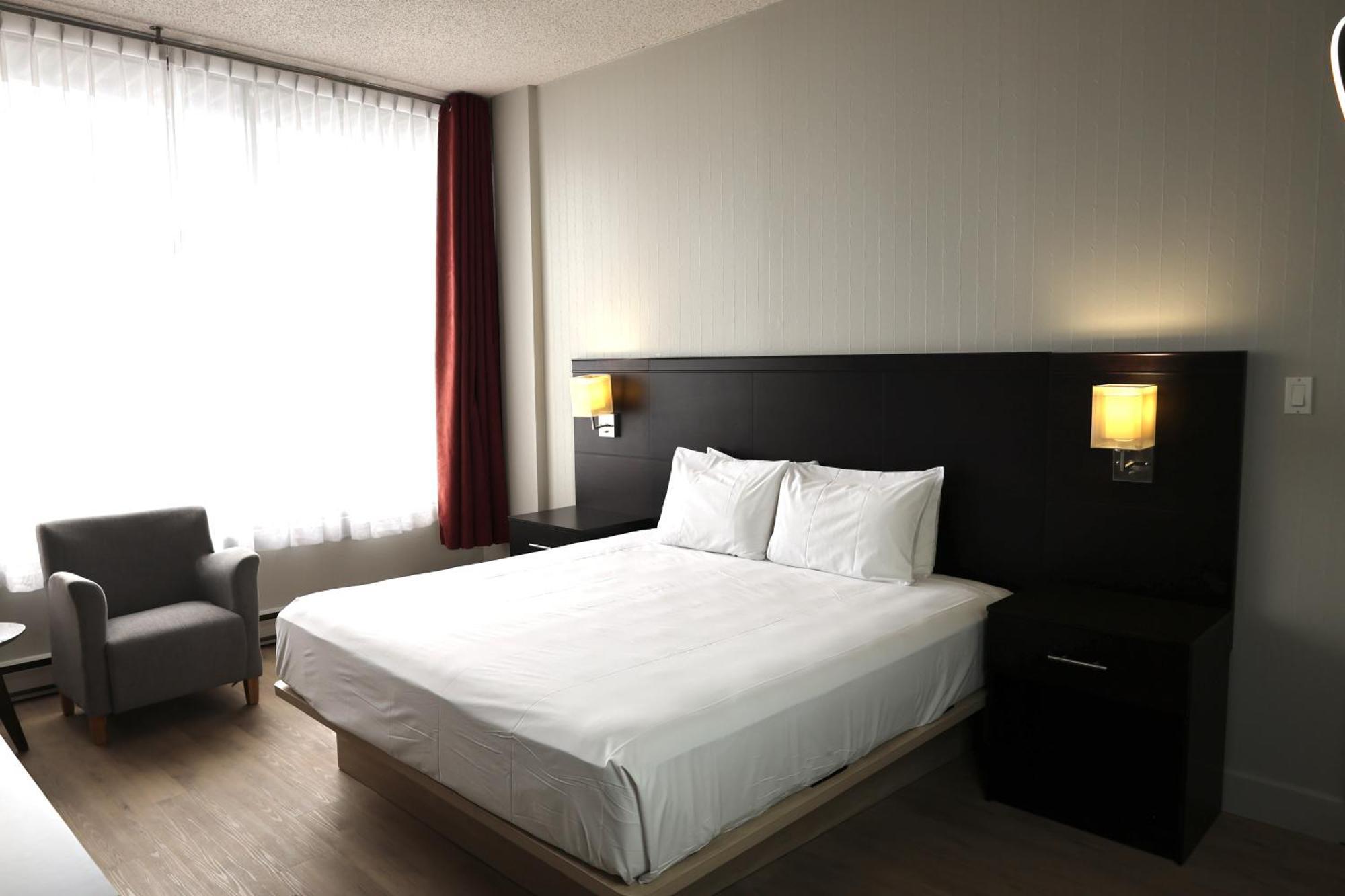 Suite Distinction Lit King-Size avec 1 Canapé-Lit Double