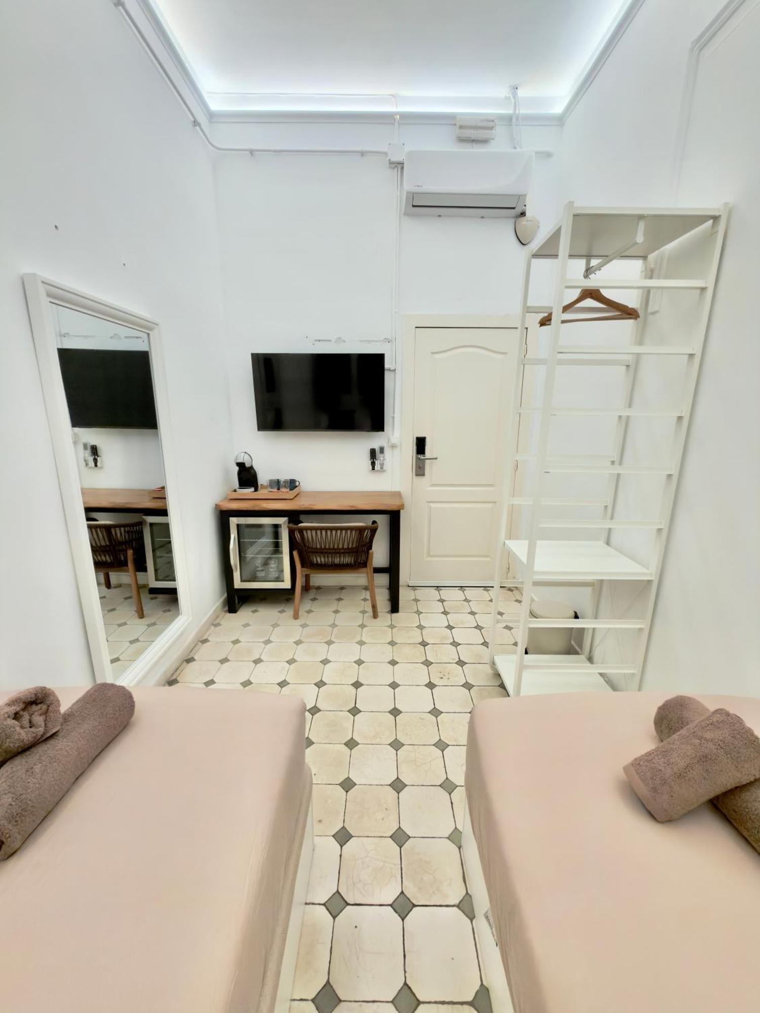 Quarto Duplo ou Twin com Casa de Banho Partilhada