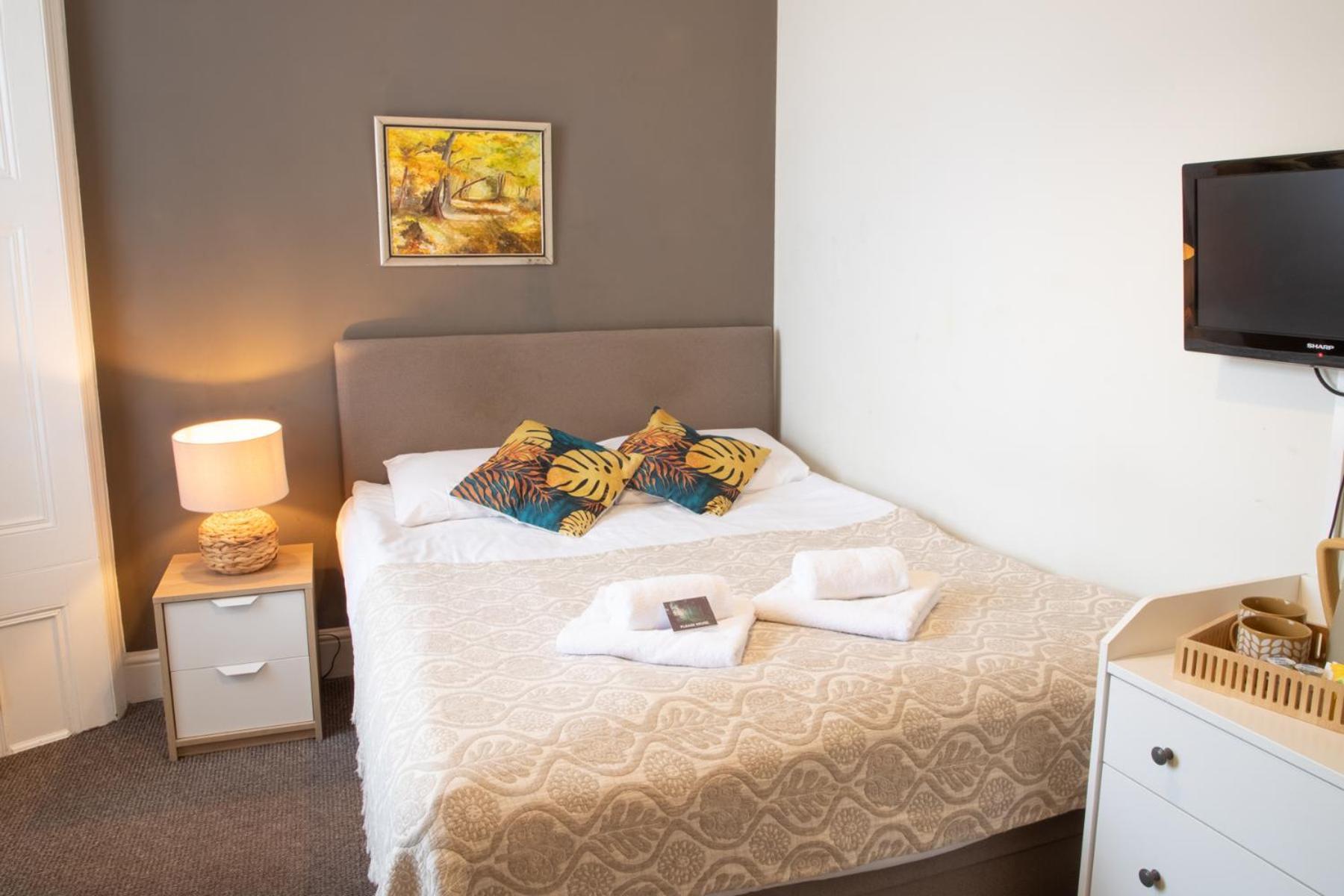 Quarto Duplo com Casa de Banho Partilhada