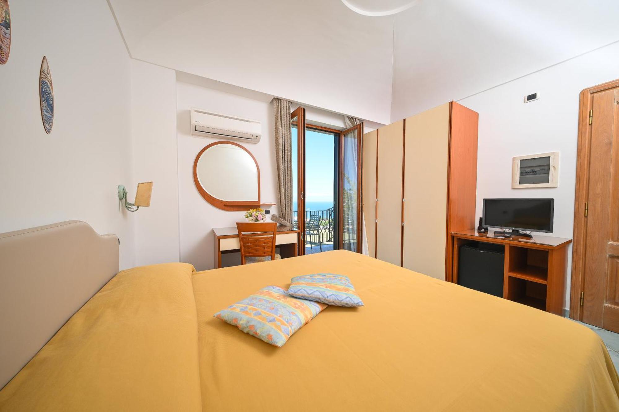 Tweepersoonskamer met 1 of 2 Bedden en Uitzicht op Zee