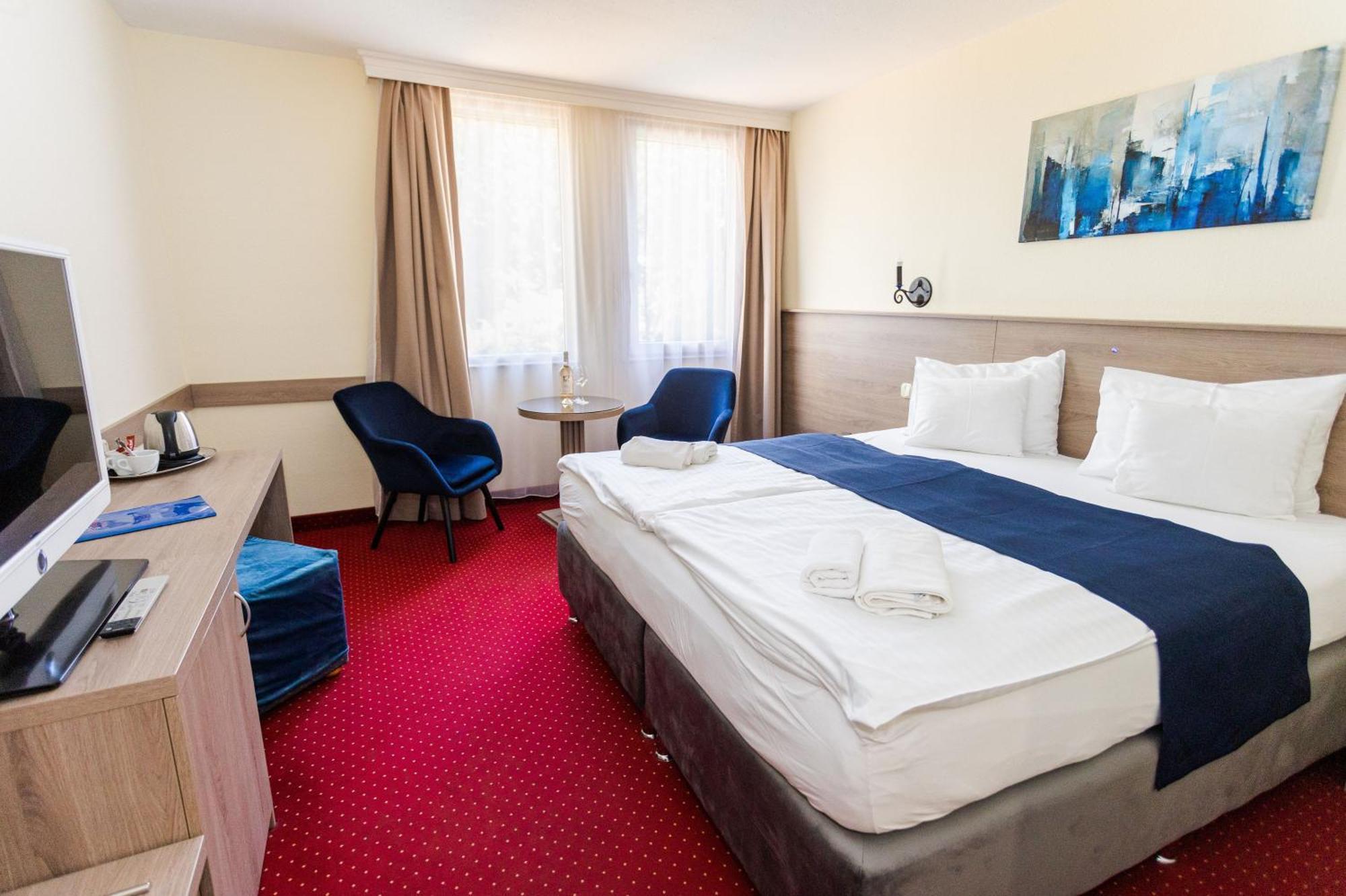 Quarto Standard com Cama de Casal ou 2 de Solteiro
