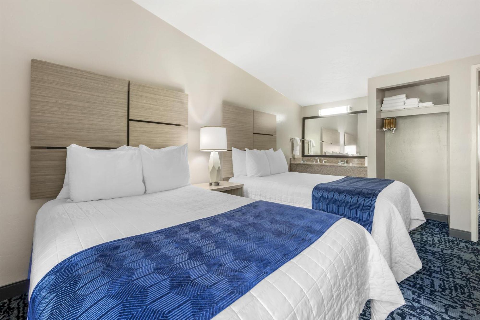 Family Suite with One King Bed, One Queen Bed and One Sofa Bed - Non-Smoking