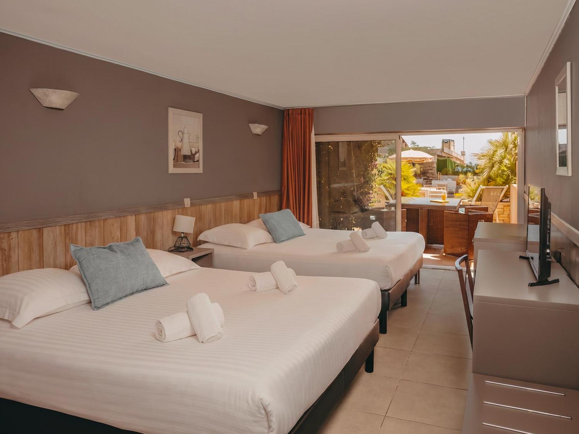 Chambre Quadruple avec Accès à la Plage