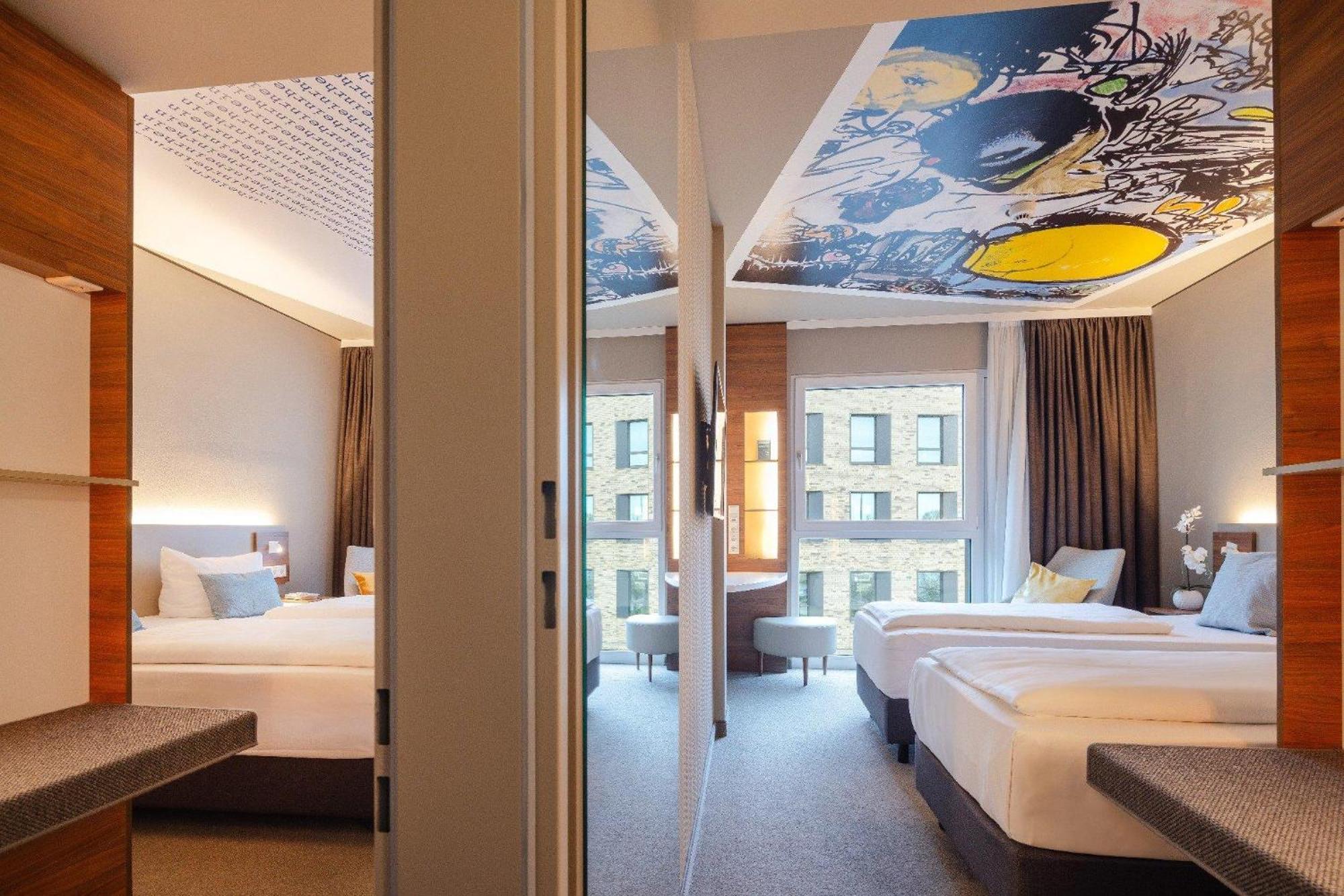 Zimmer mit 2 Kingsize-Betten