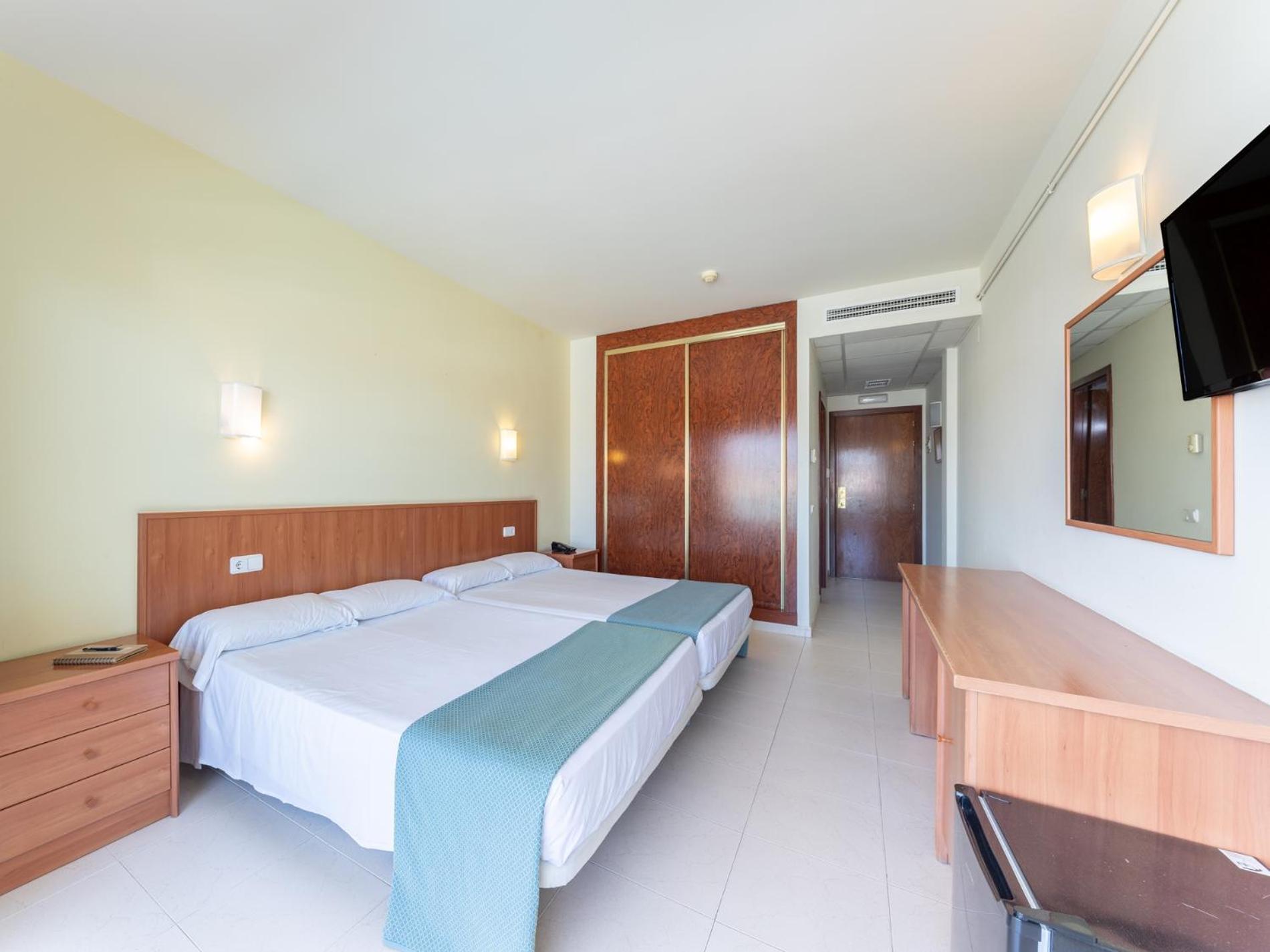 Habitación Cuádruple (2 adultos + 2 niños)