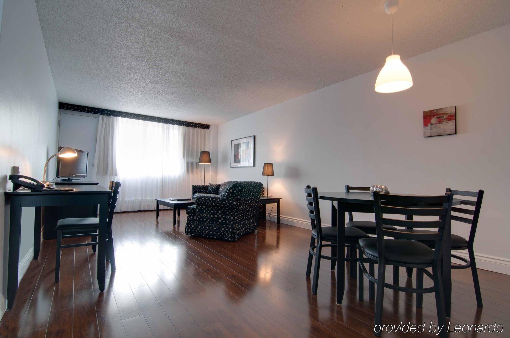 Suíte de 1 Quarto - Piso de Madeira
