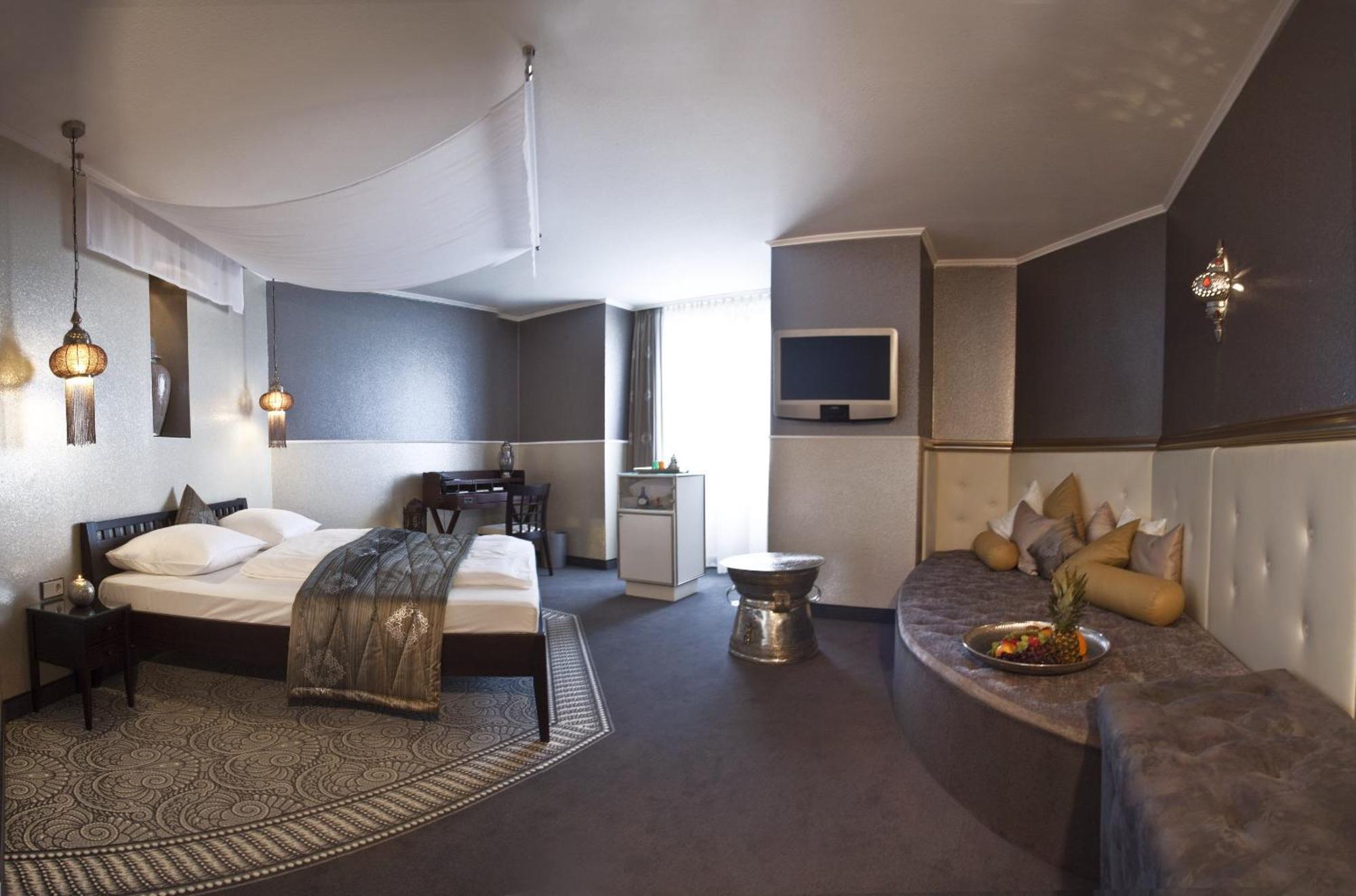 Suite mit Kingsize-Bett mit Whirlpool
