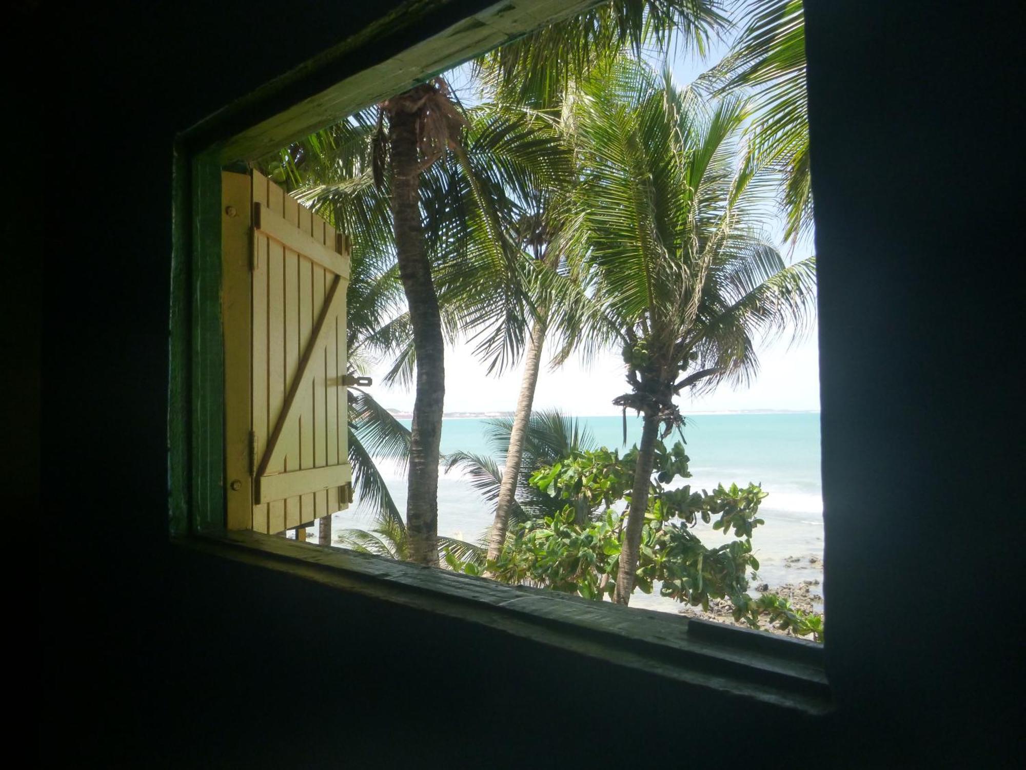 Quarto Quádruplo com Vista do Mar.