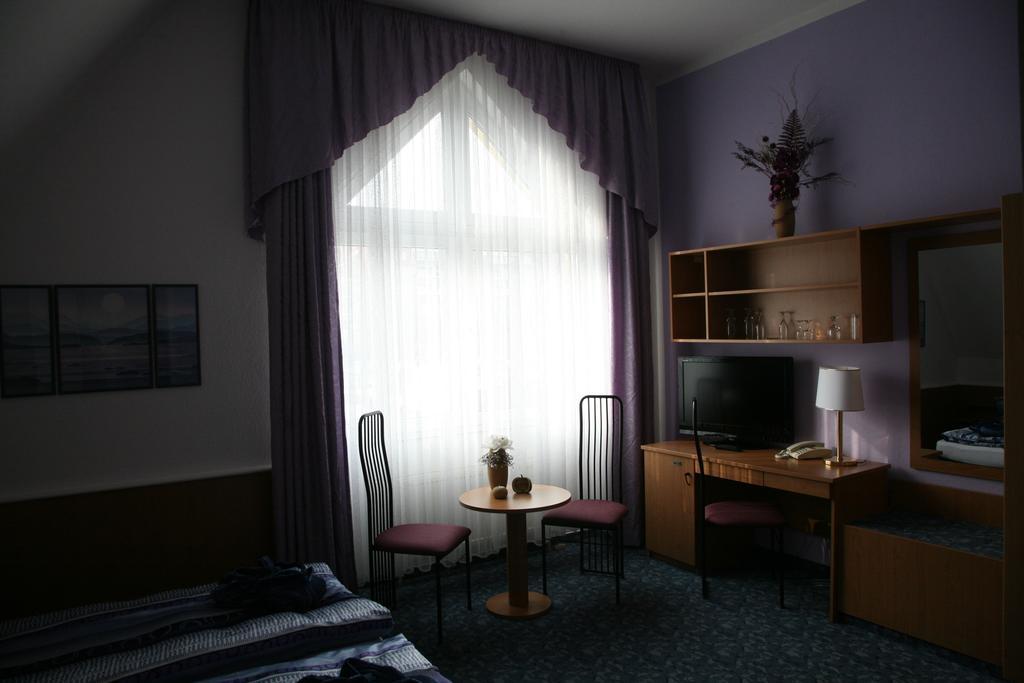 Doppel- oder Zweibettzimmer