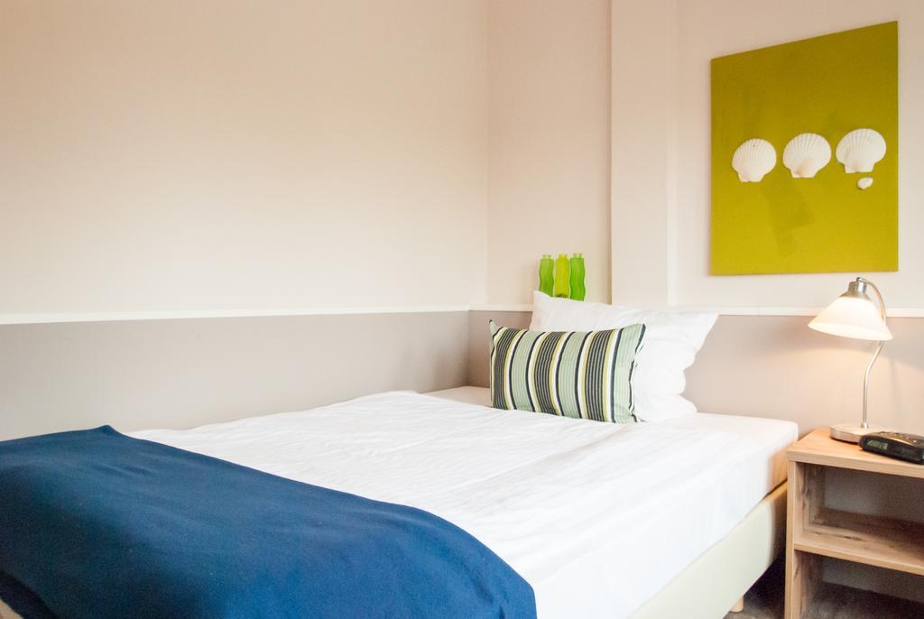 Kamer met 1 Groot Bed of 2 Aparte Bedden en Uitzicht op de Stad