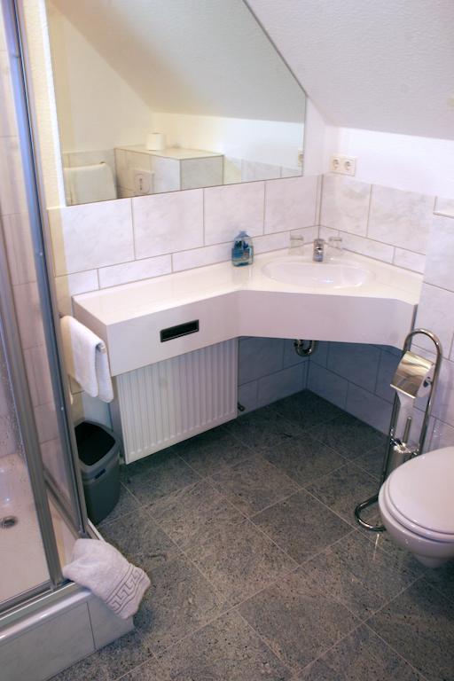 Dreibettzimmer mit zwei getrennten Schlafzimmern