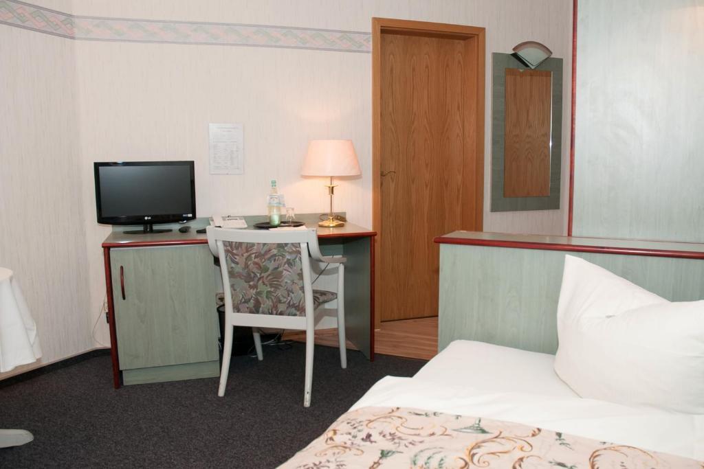 Doppel- oder Zweibettzimmer