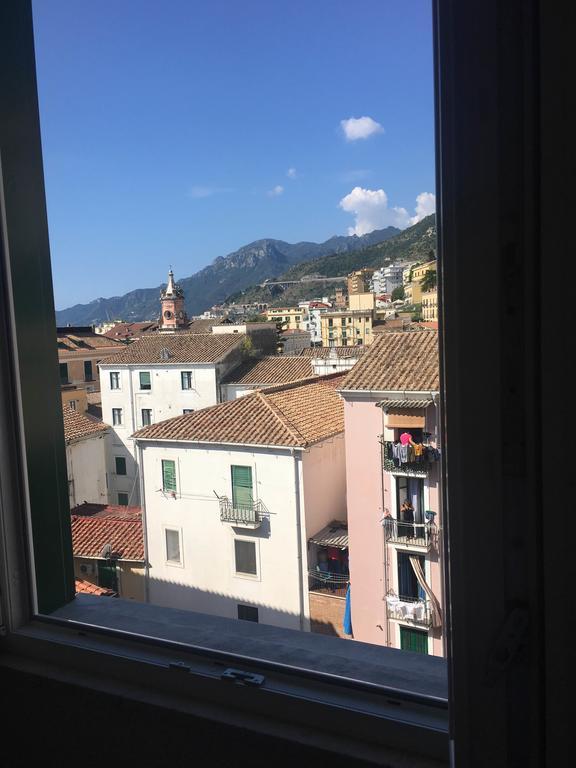 Camera Doppia con Letti Singoli e Bagno in Comune