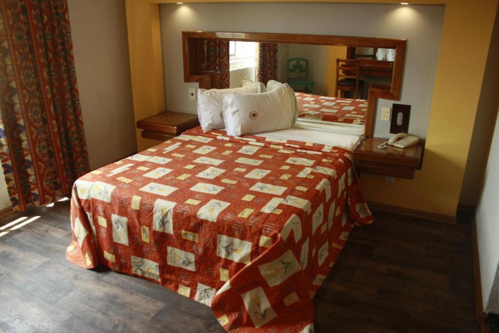 Quarto com Cama Queen-size