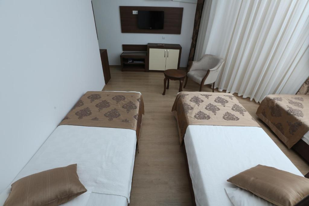 Standard Doppel- oder Zweibettzimmer mit seitlichem Meerblick