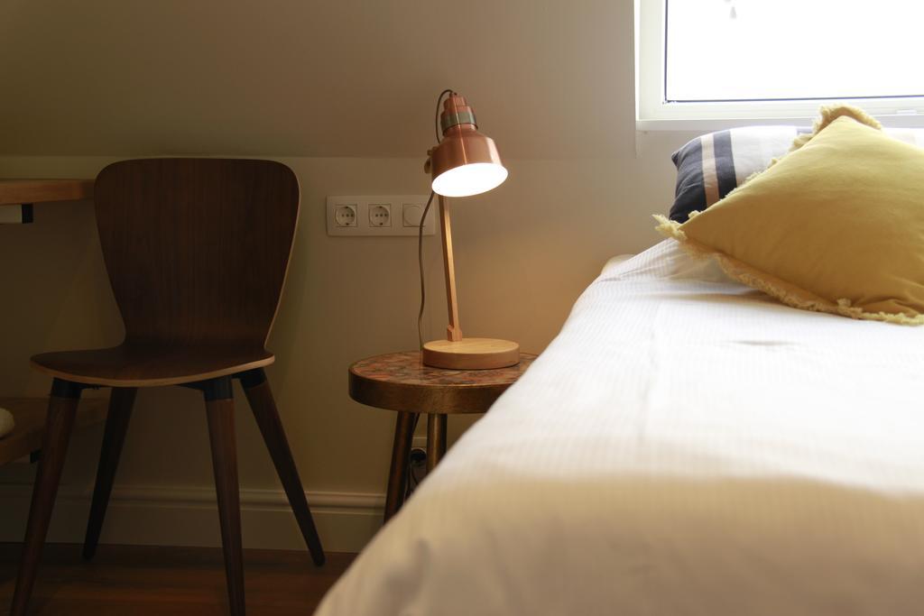 Kleine Tweepersoonskamer met 2 Aparte Bedden