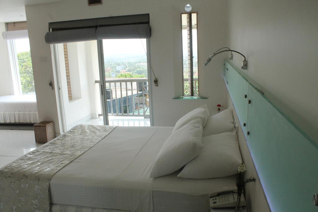 Deluxe Driepersoonskamer met Balkon