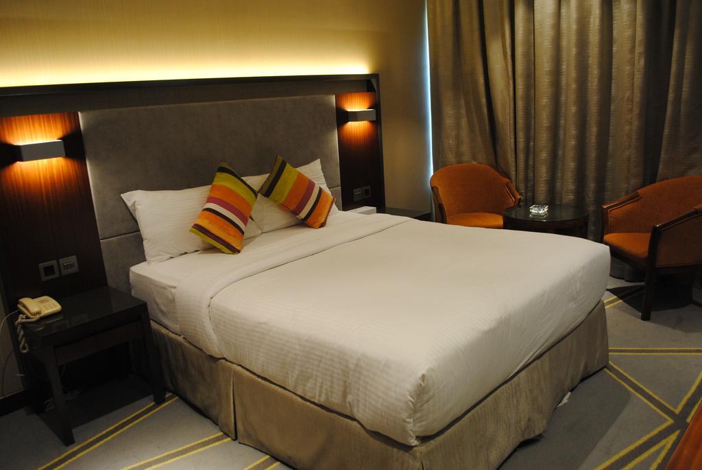 Habitación Doble Deluxe (2 adultos + 1 niño)