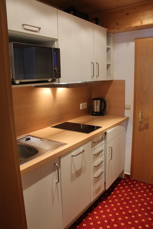 Studio-Apartment für 2 Erwachsene mit Terrasse und Blick auf das Grün