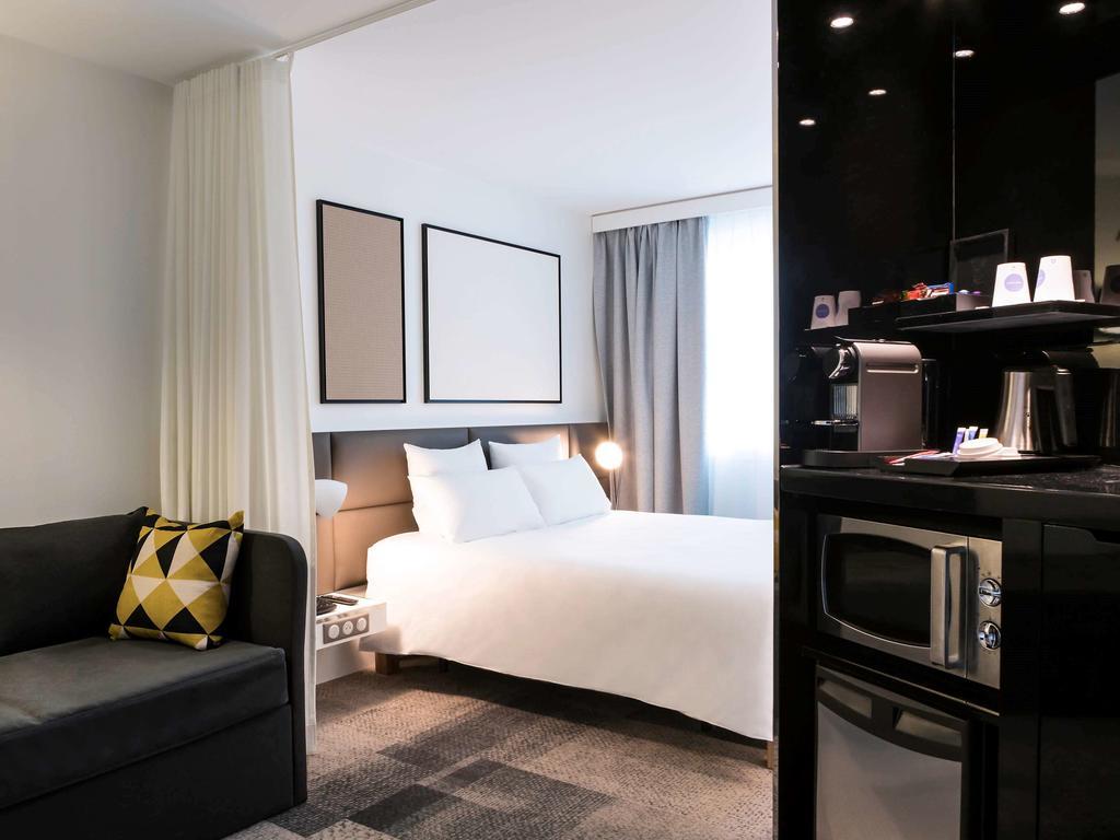 Suite Executiva com Cama de Casal e Sofá-cama