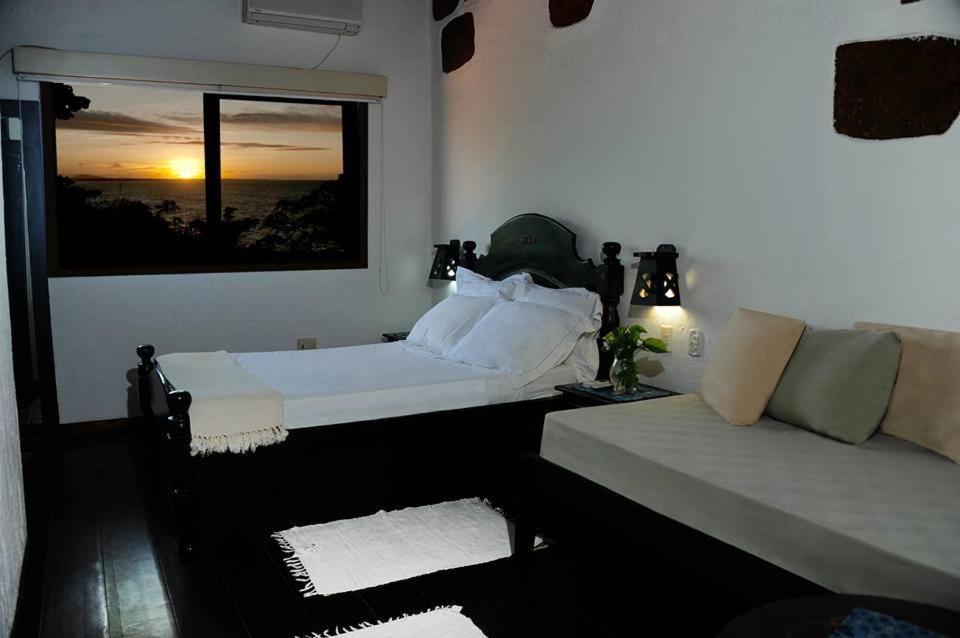 Quarto Deluxe (2 Adultos + 1 Criança)