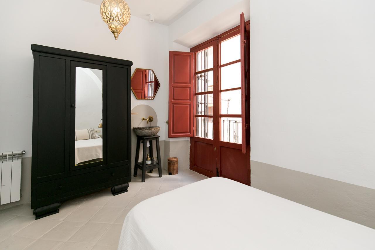 Quarto Triplo com Banheiro Compartilhado