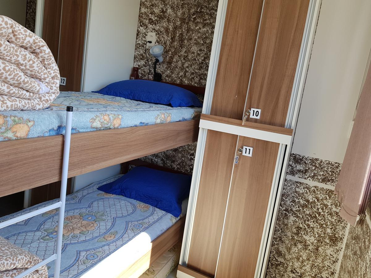 Beliche em Dormitório Misto com Banheiro Compartilhado