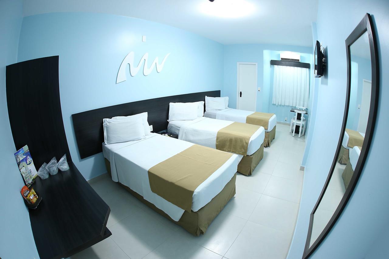 Quarto Triplo com 3 Camas de Solteiro