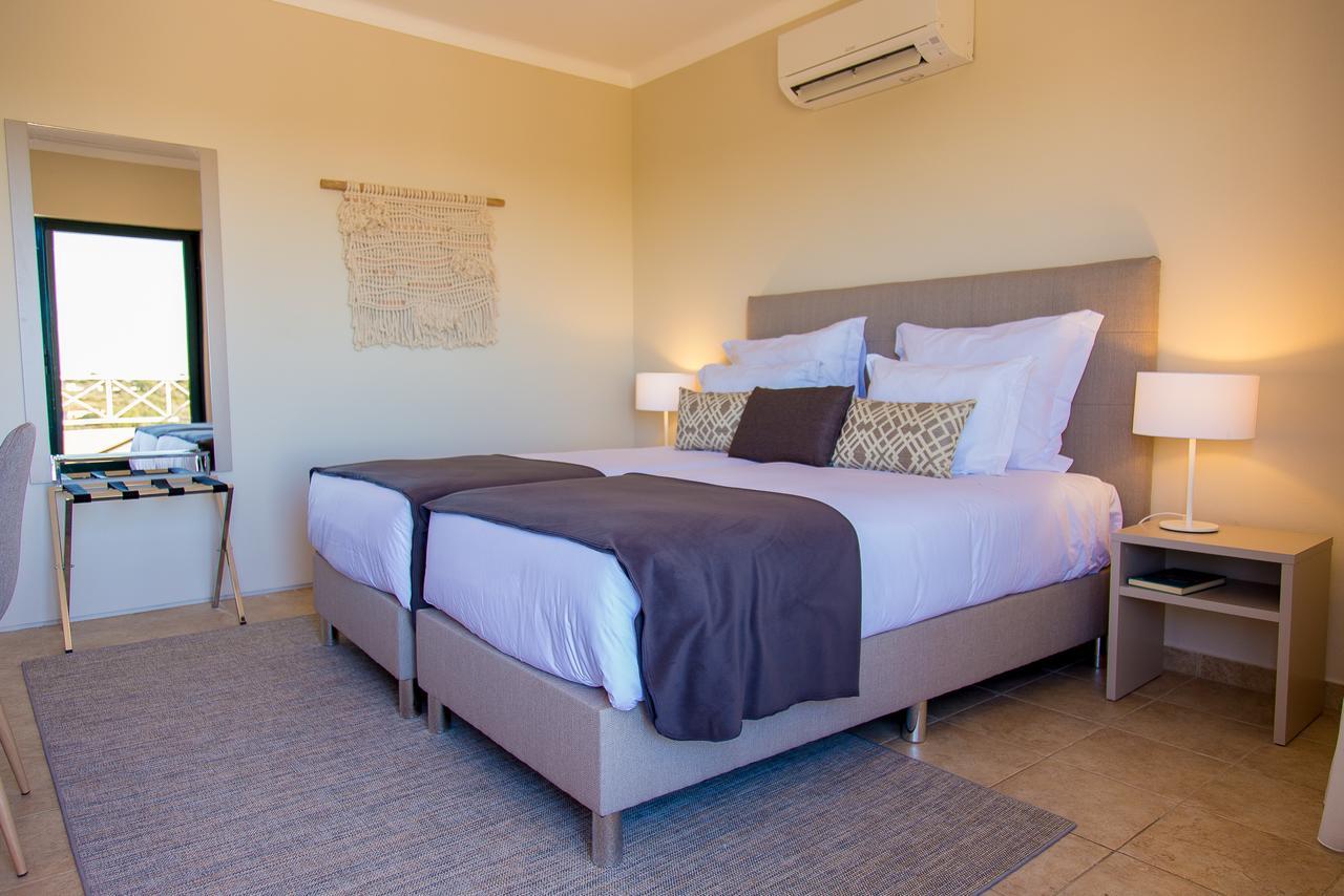 Two-Bedroom Triplex Apartment with Balcony