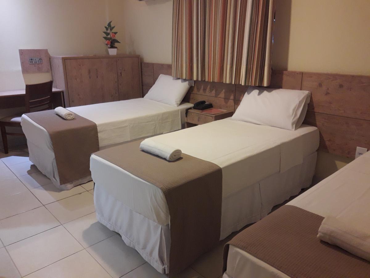 Quarto Triplo Executivo