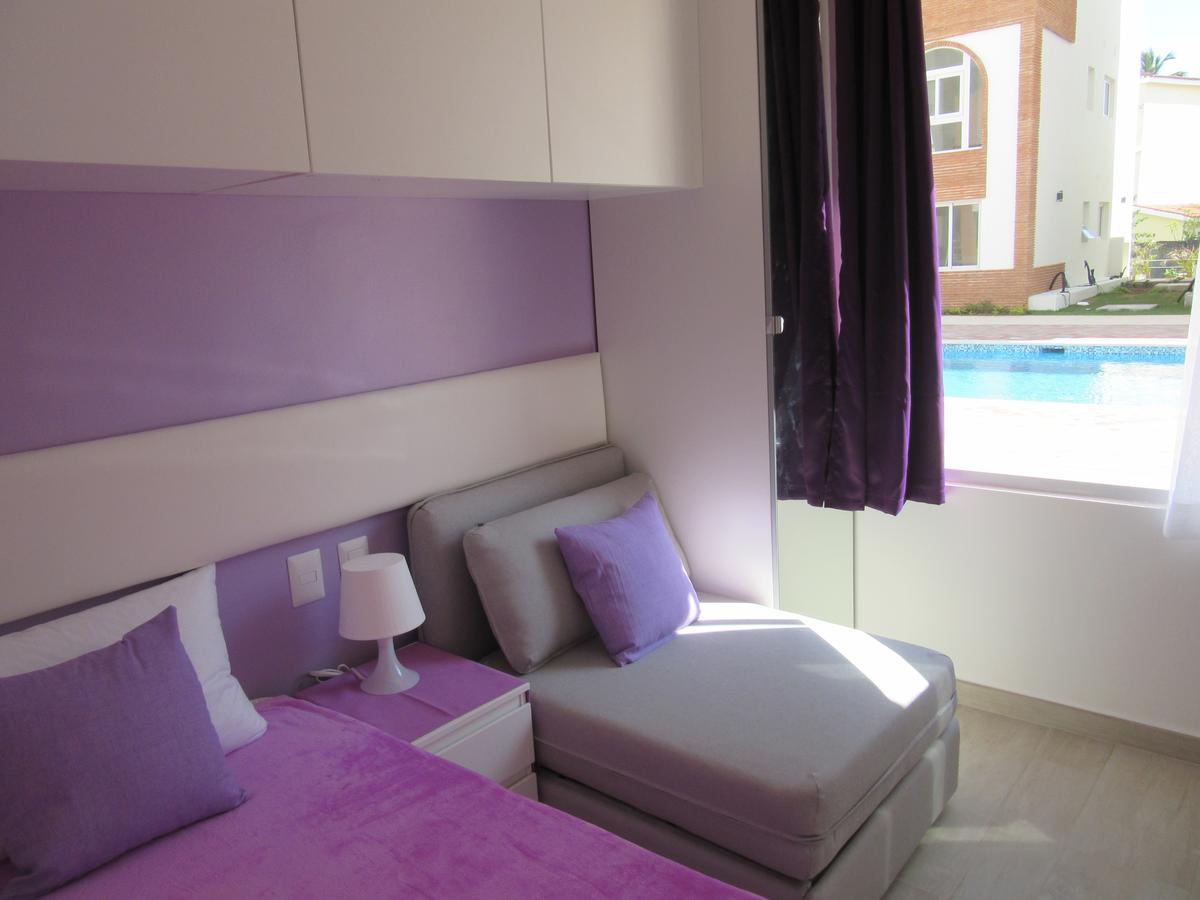 Presidential Deluxe Suite with patio & pool view and access (ground floor)