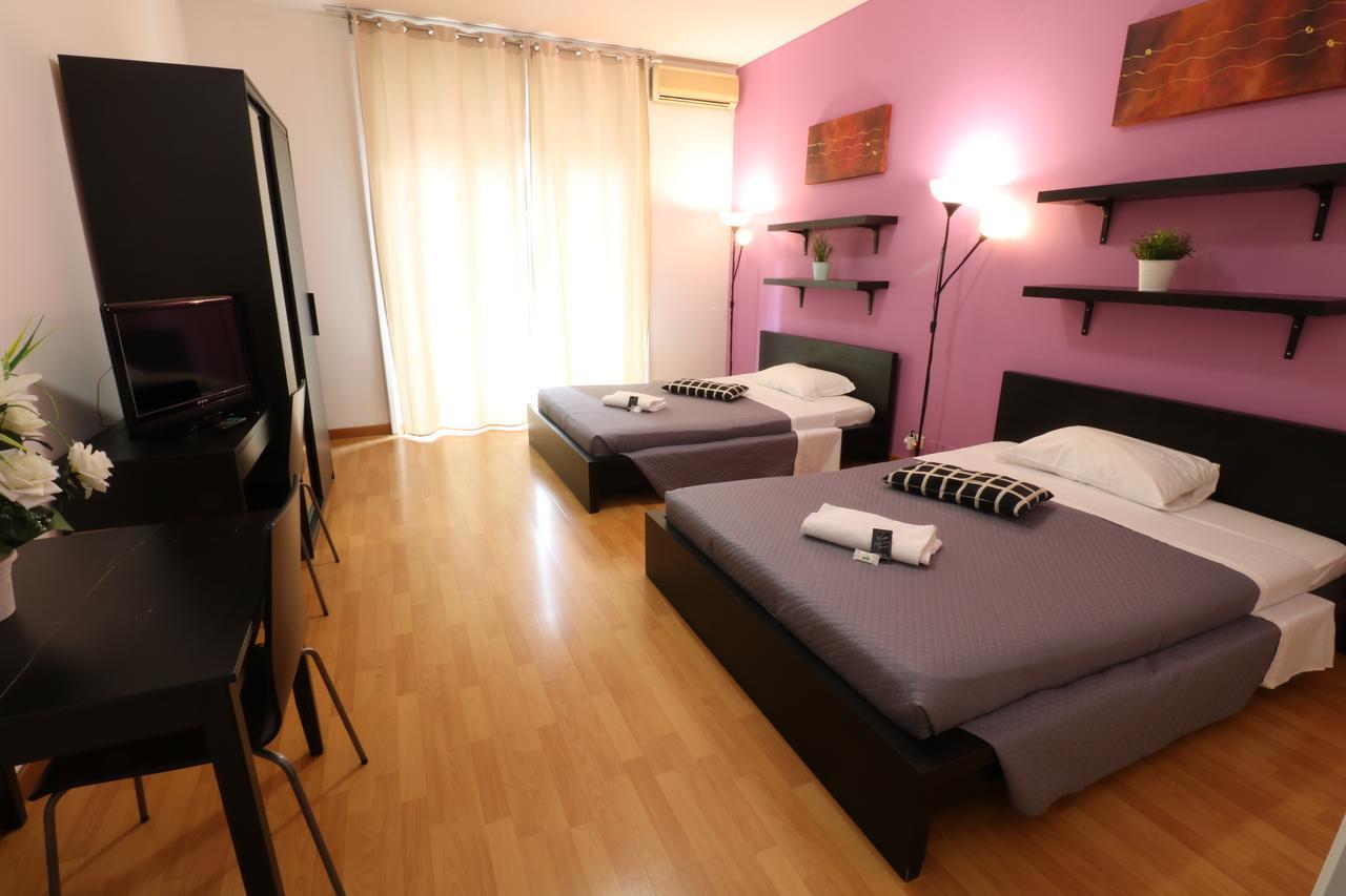 Habitación Doble con baño compartido externo - 2 camas individuales