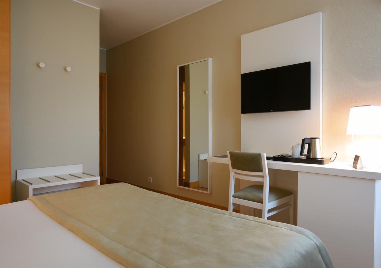 Quarto Duplo com Vista Cidade - 1 ou 2 Camas