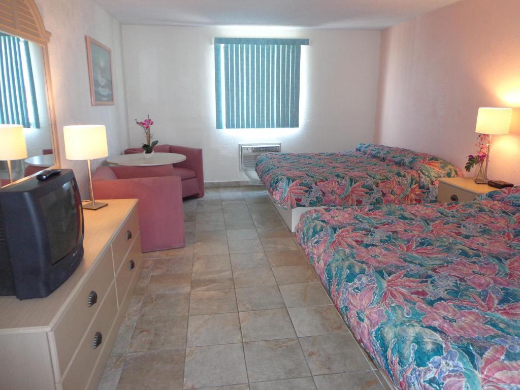 Two Room Suite with Private Balcony & Poolside